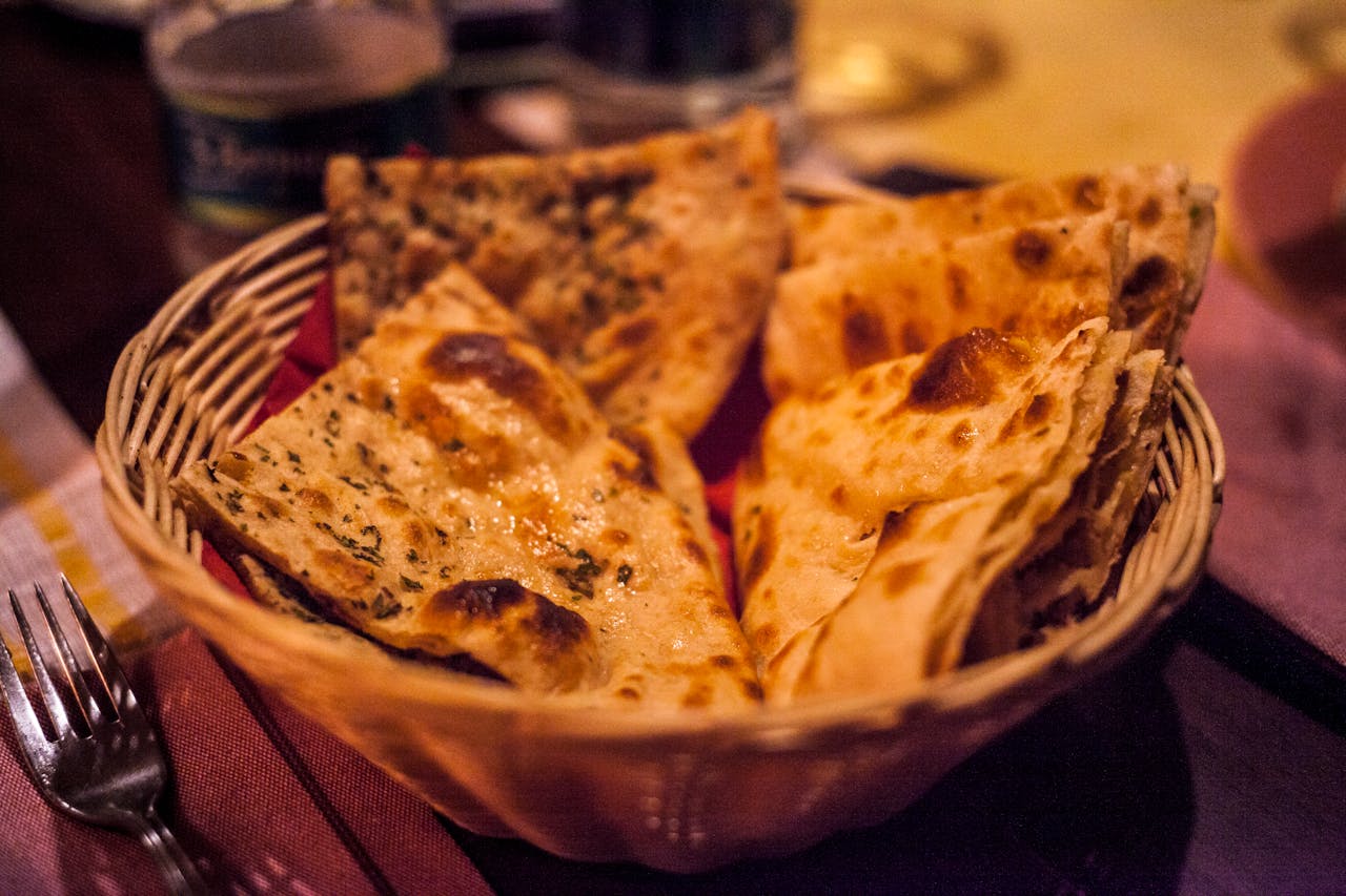 Soft and smoky tandoori roti served at Petal and Plate