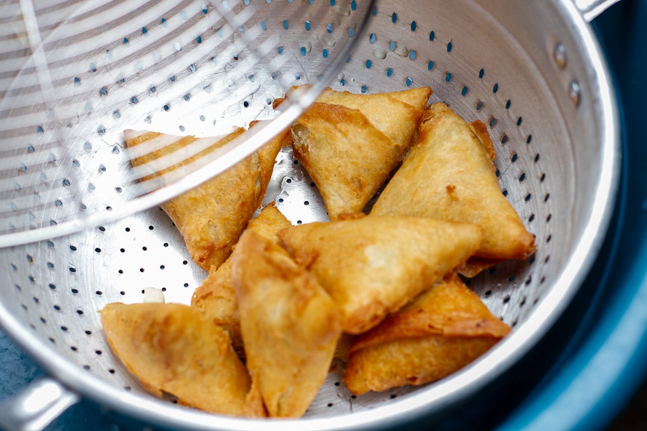 Crispy small samosas served at Petal and Plate, an open garden restaurant